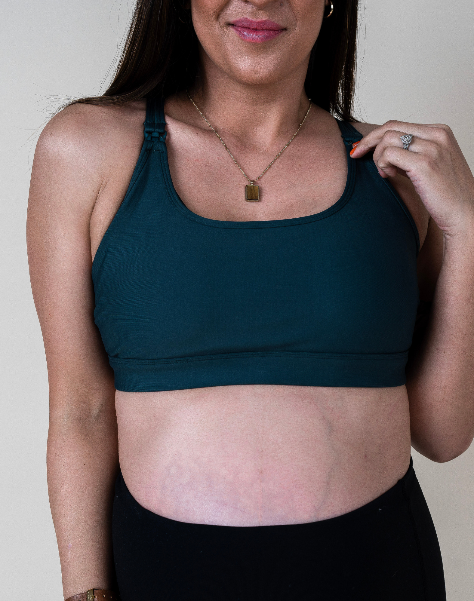 close up view of maternity nursing bra in dark green